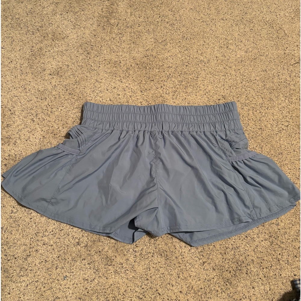 Free People Movement. Light blue shorts. New condition. Size medium.